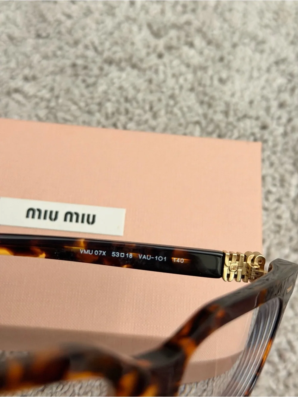 Miu Miu Tortoiseshell Frame Glasses with Gold Accents